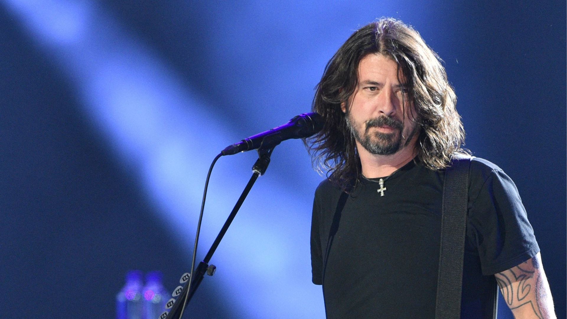 Dave Grohl Standing In Front Of Mic
