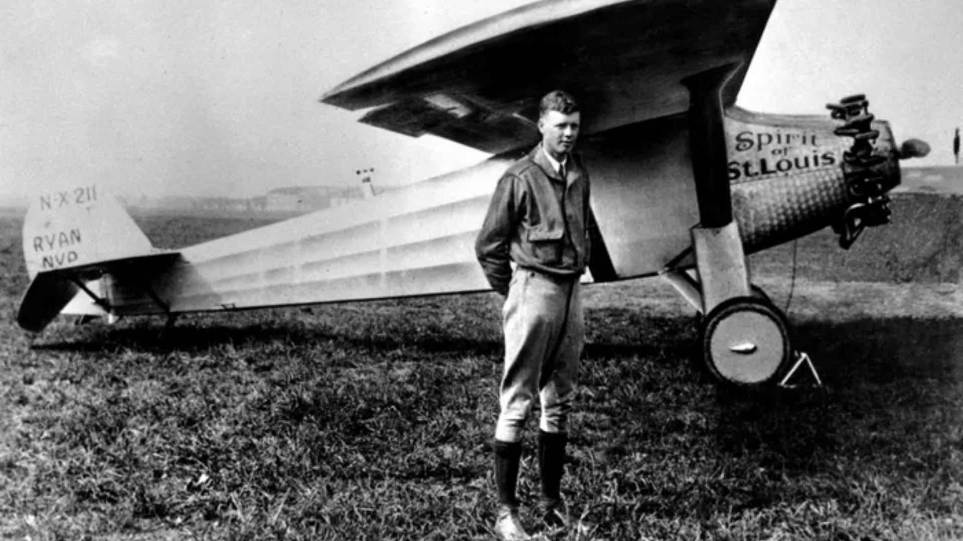Charles Lindbergh Standing Next To A Plane