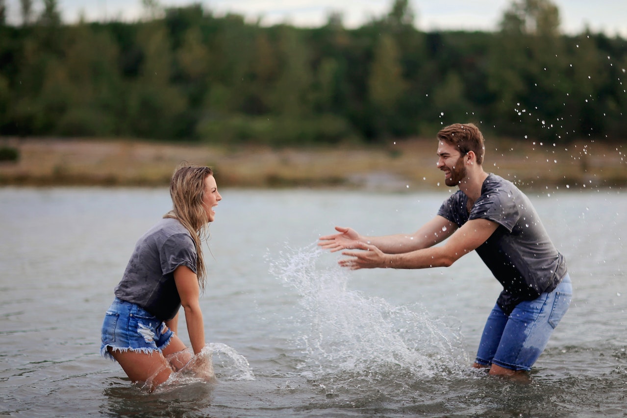 Man and Woman Playing on the Water