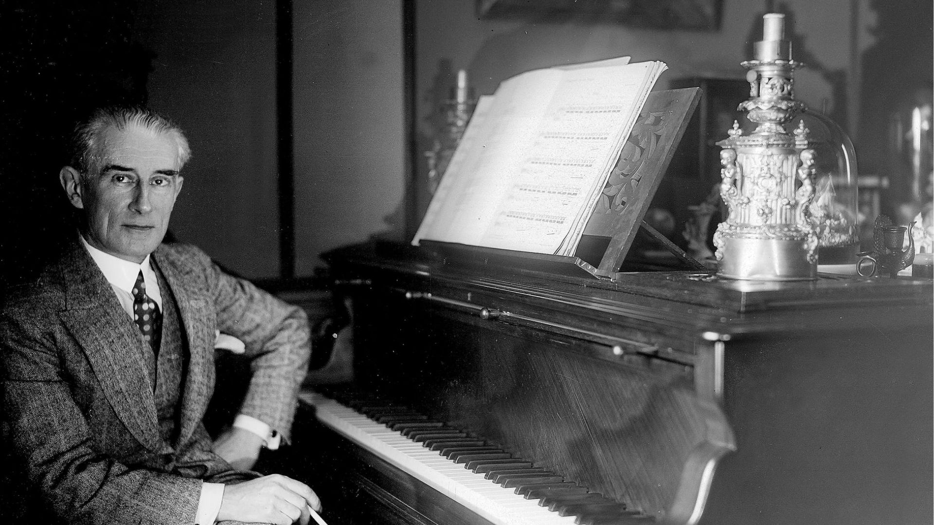 Maurice Ravel Sitting In Front Of Paino