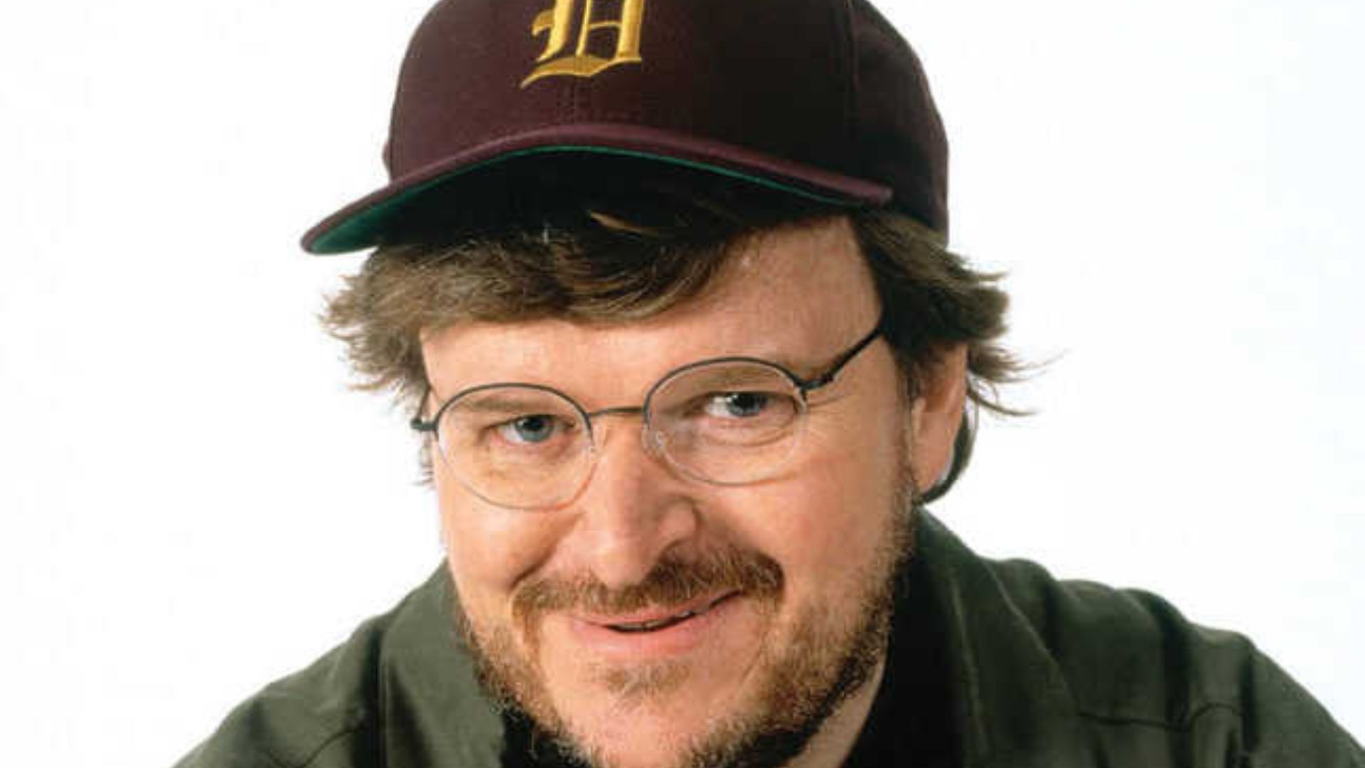 Michael Moore Wearing Cap And Eyeglasses
