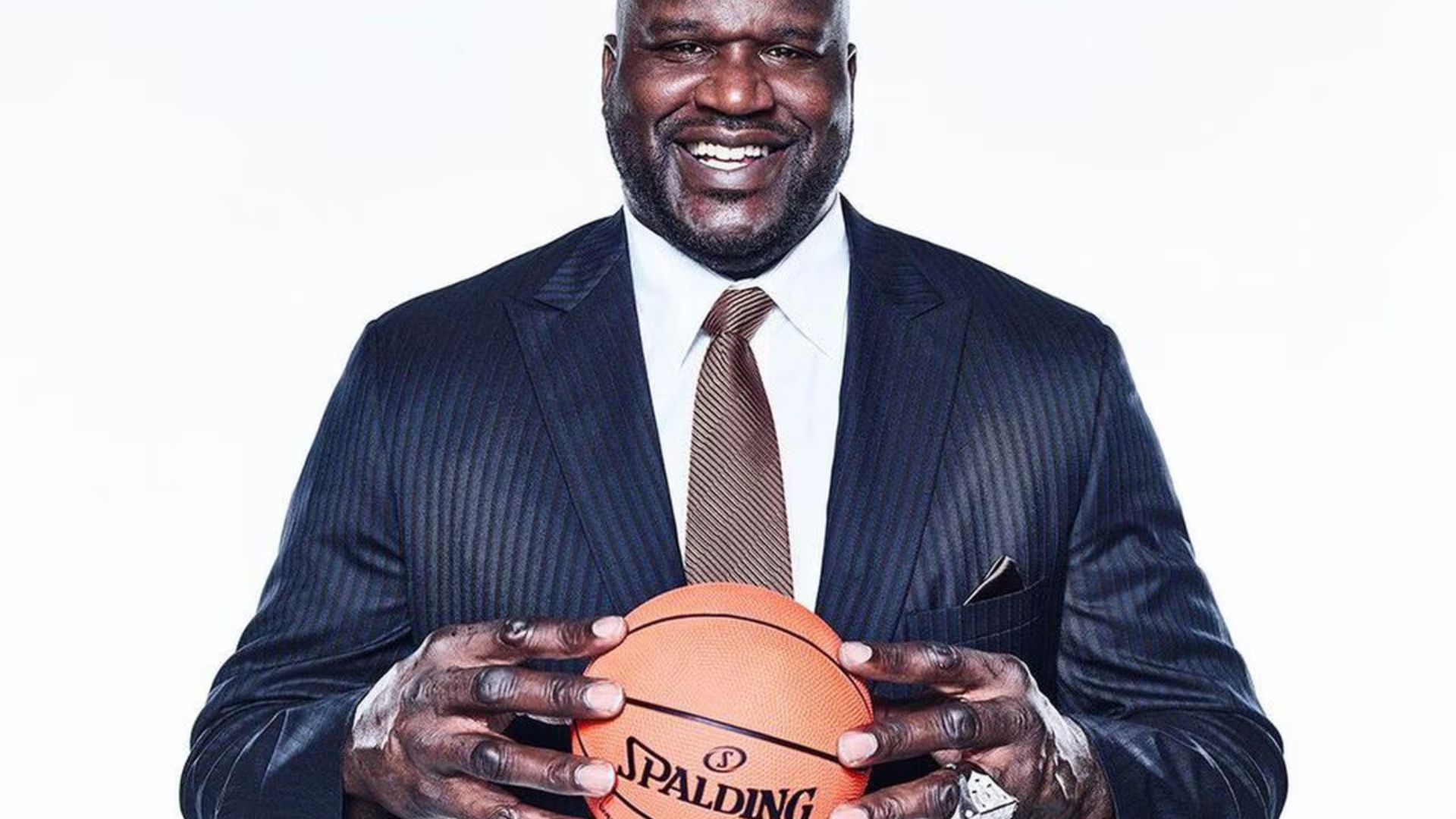 Shaquille O'Neal Holding Basketball