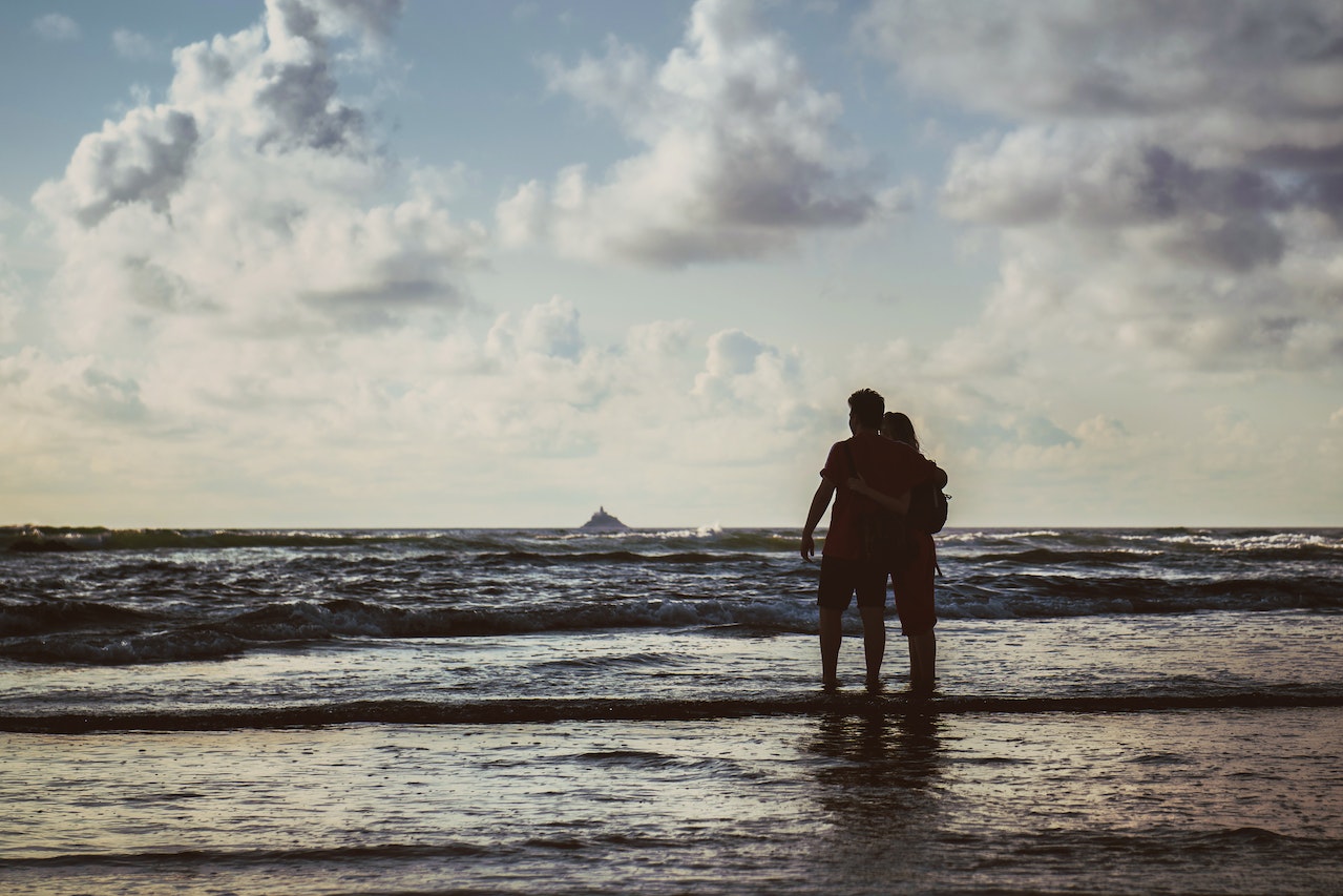Couple Standing on Seashore
