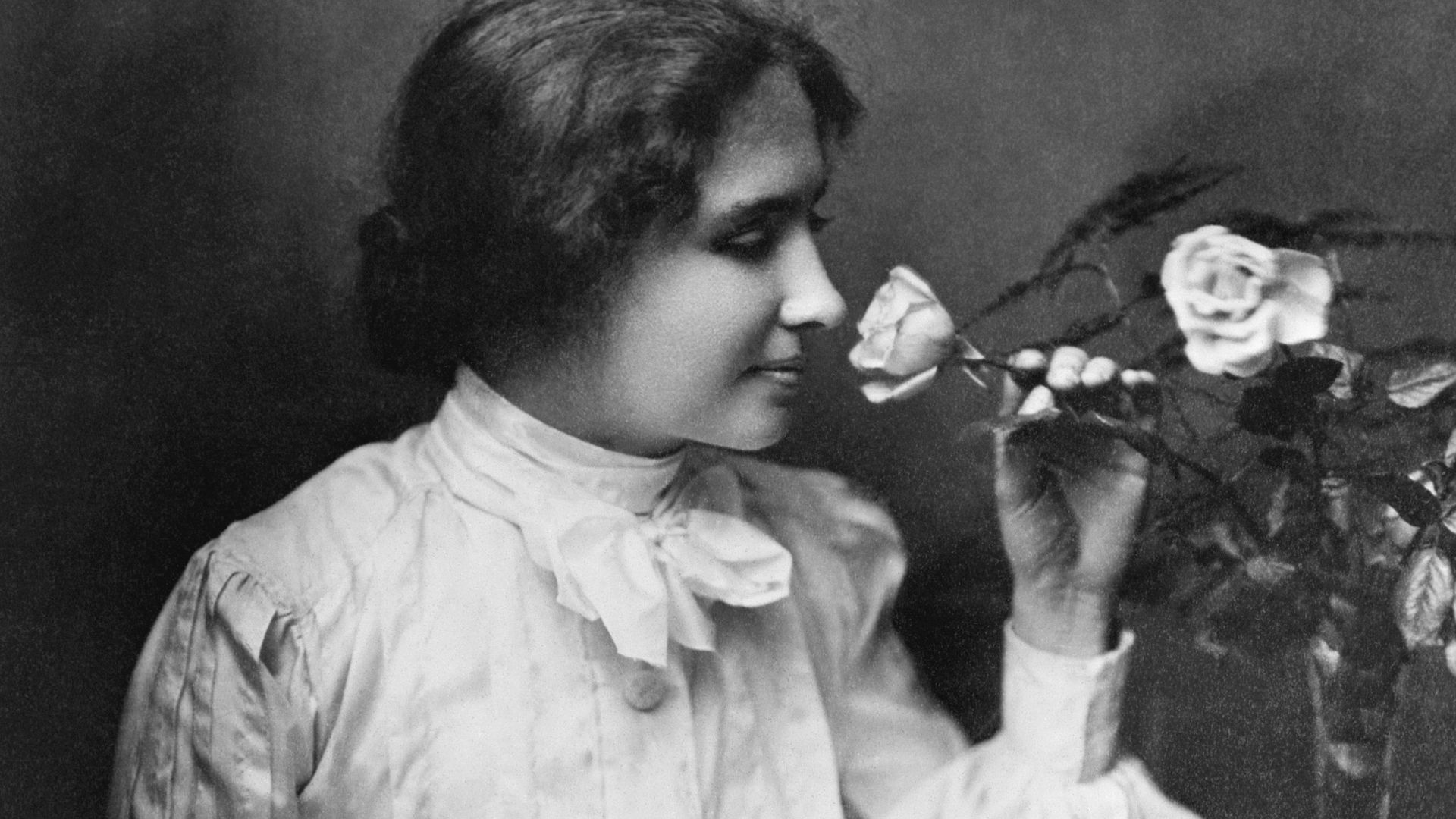 Helen Keller Smelling A Flower