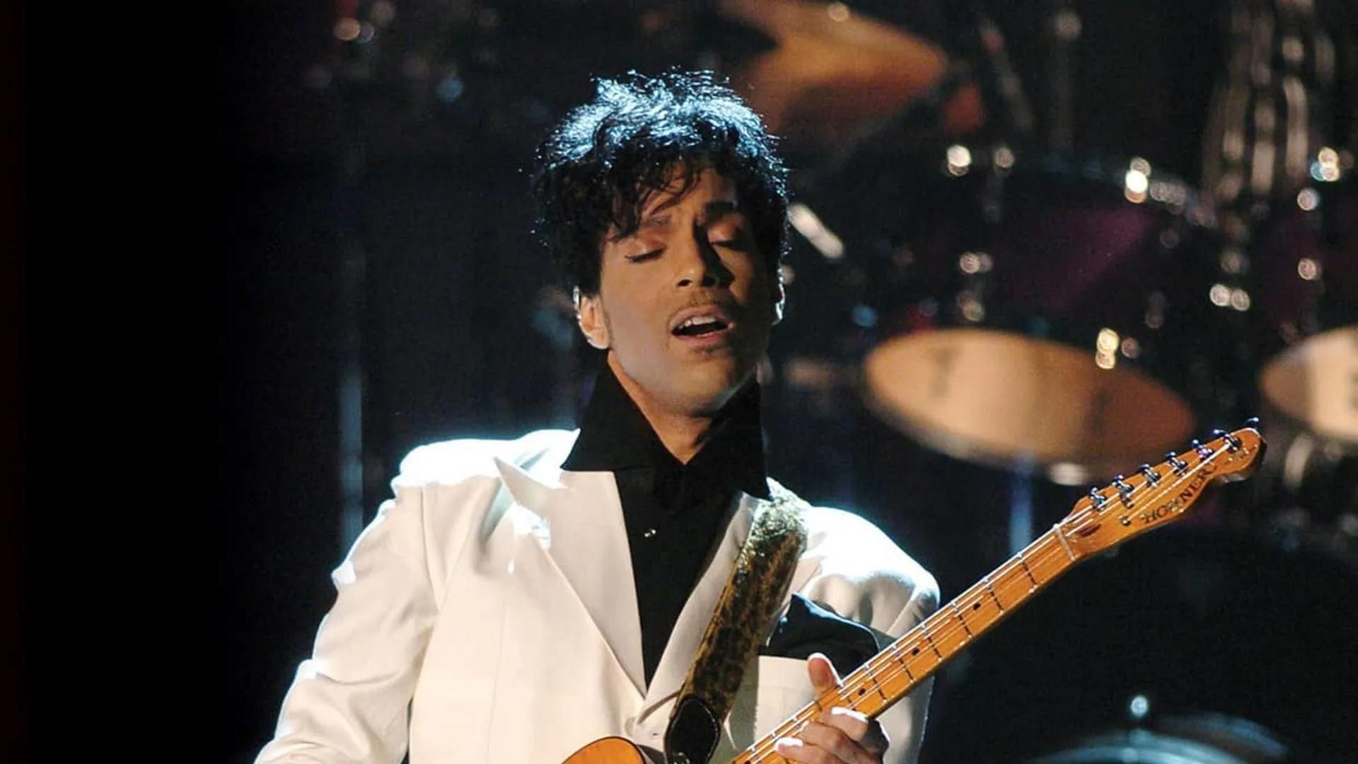 Prince Performing With His Guitar