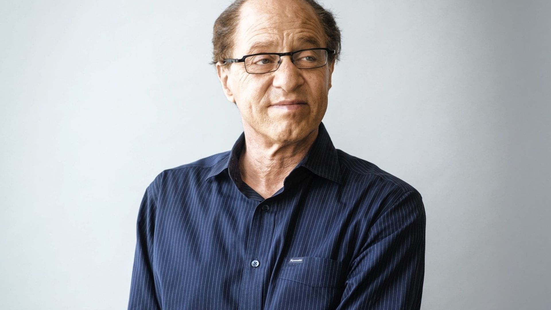 Raymond Kurzweil Wearing Blue Shirt and EyeGlasses