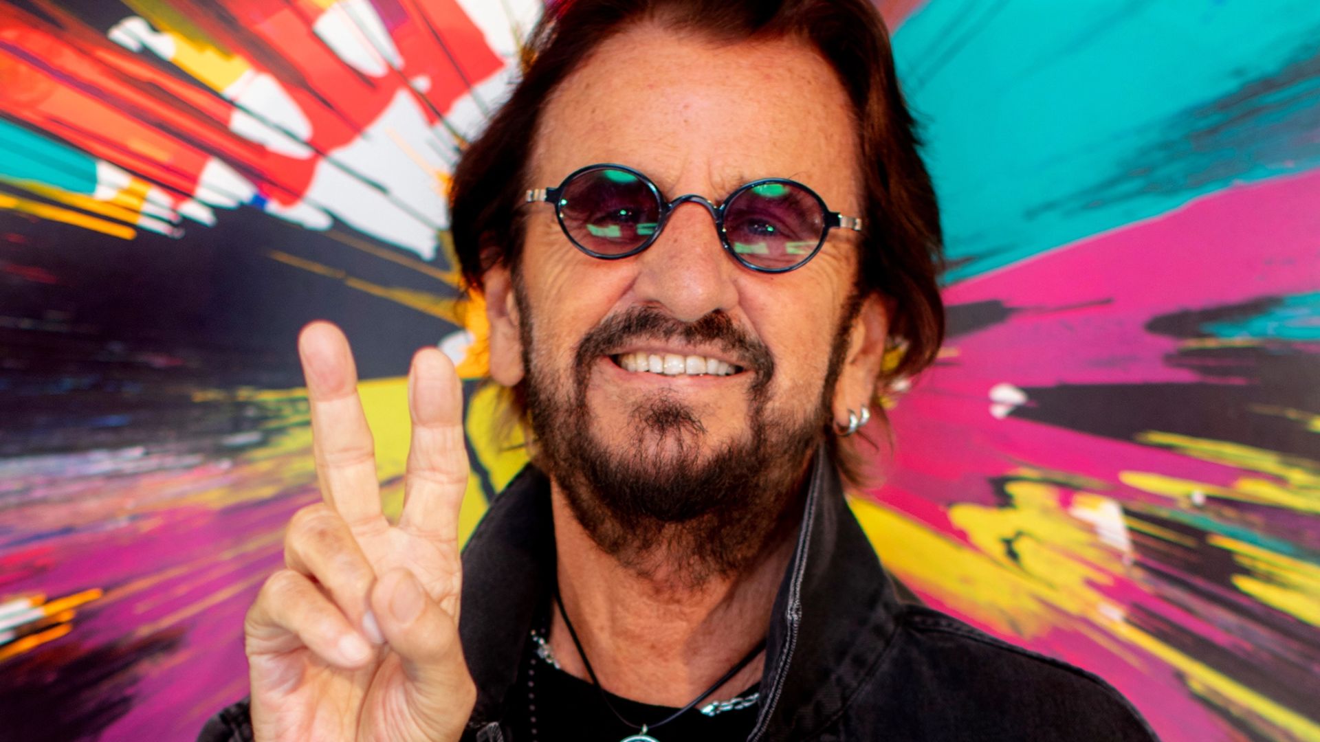 Ringo Starr Doing The Victory Sign