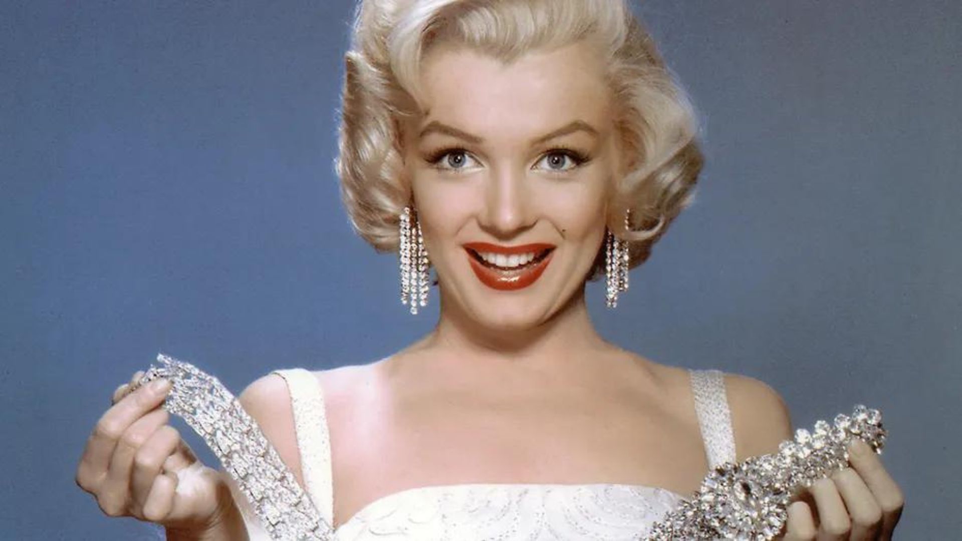 Marilyn Monroe Smiling And Wearing White Dress