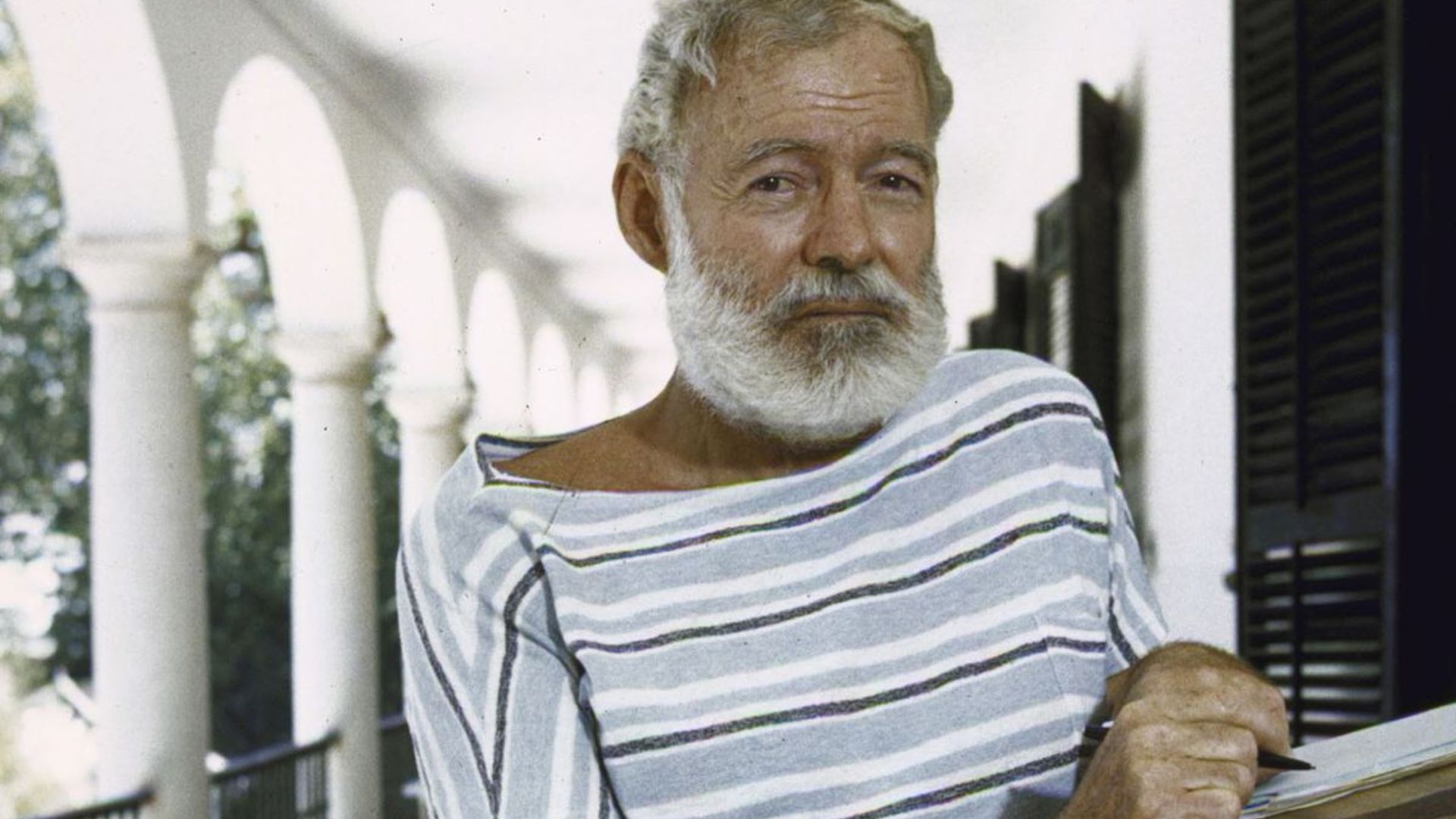 Ernest Hemingway Writing, Wearing A Stripe Shirt