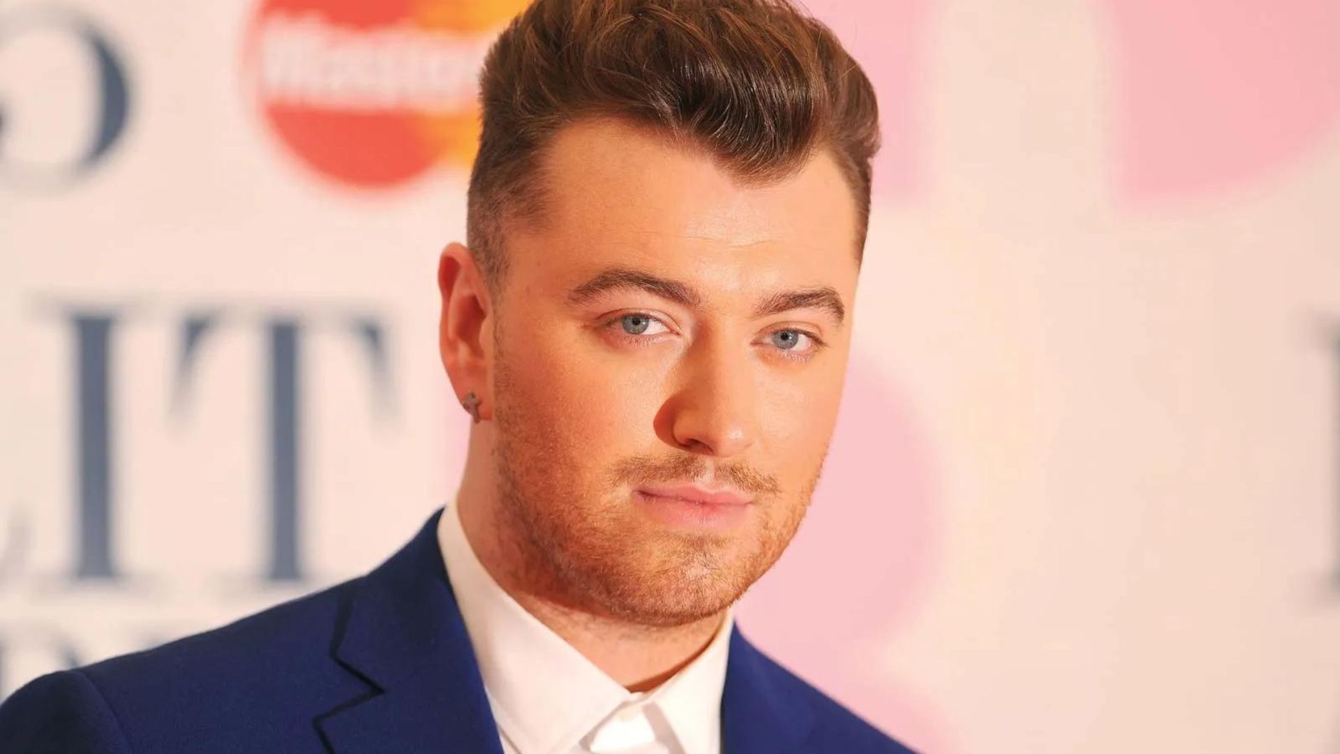 Sam Smith Wearing A Blue Suit