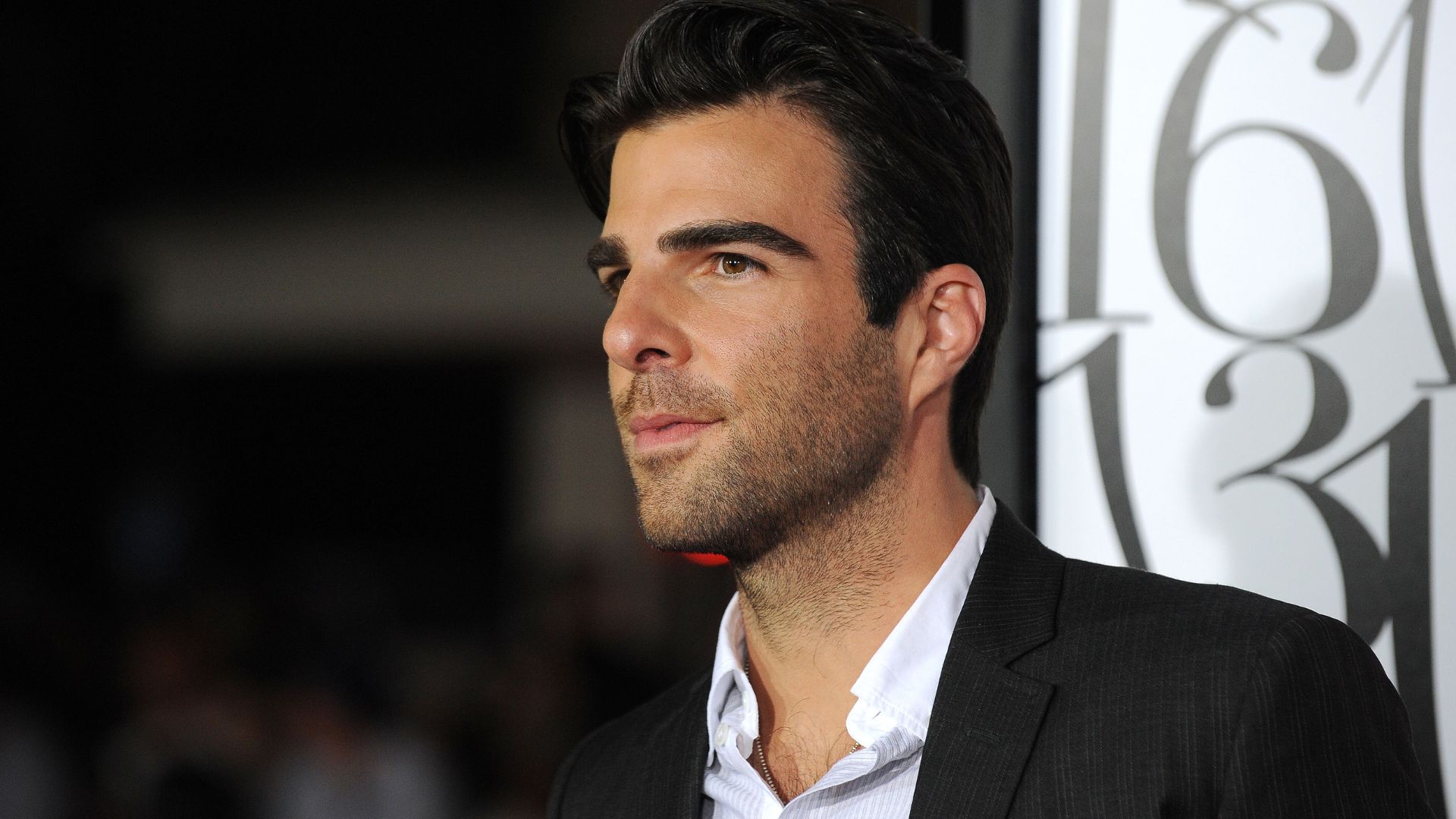 Zachary Quinto Wearing A Black And White Suit