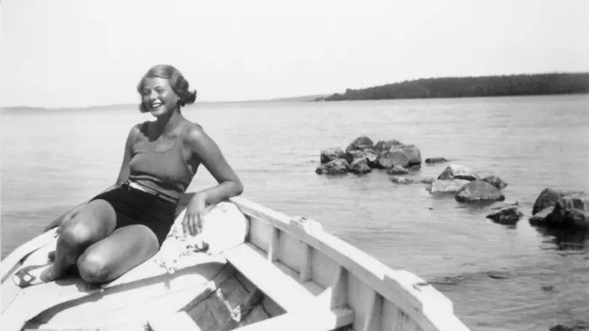 Ingrid Bergman Sitting On A Boat