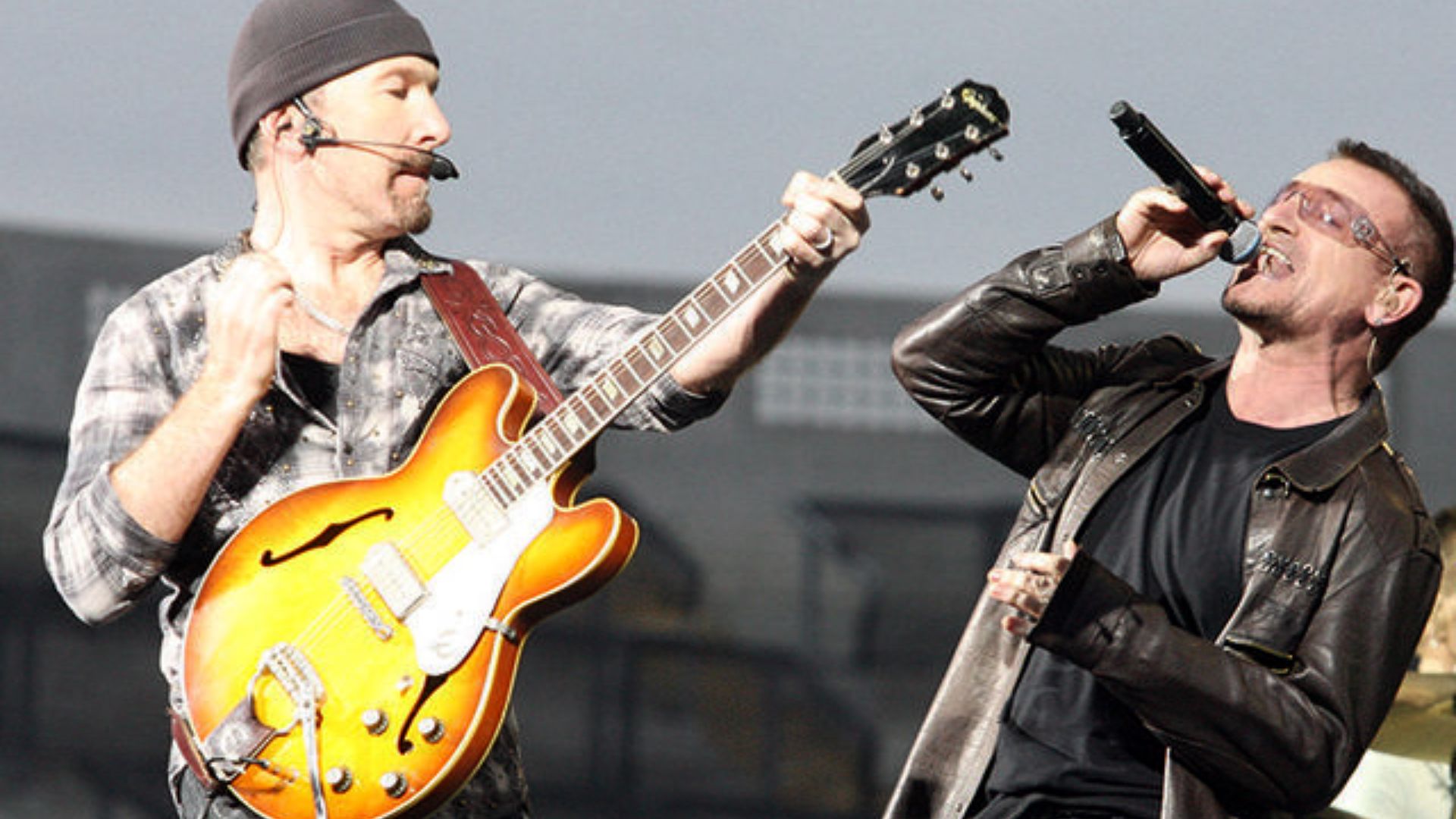 David Howell Evans Playing Guitar with Bono, Vocalist of the Dublin Rock Band U2