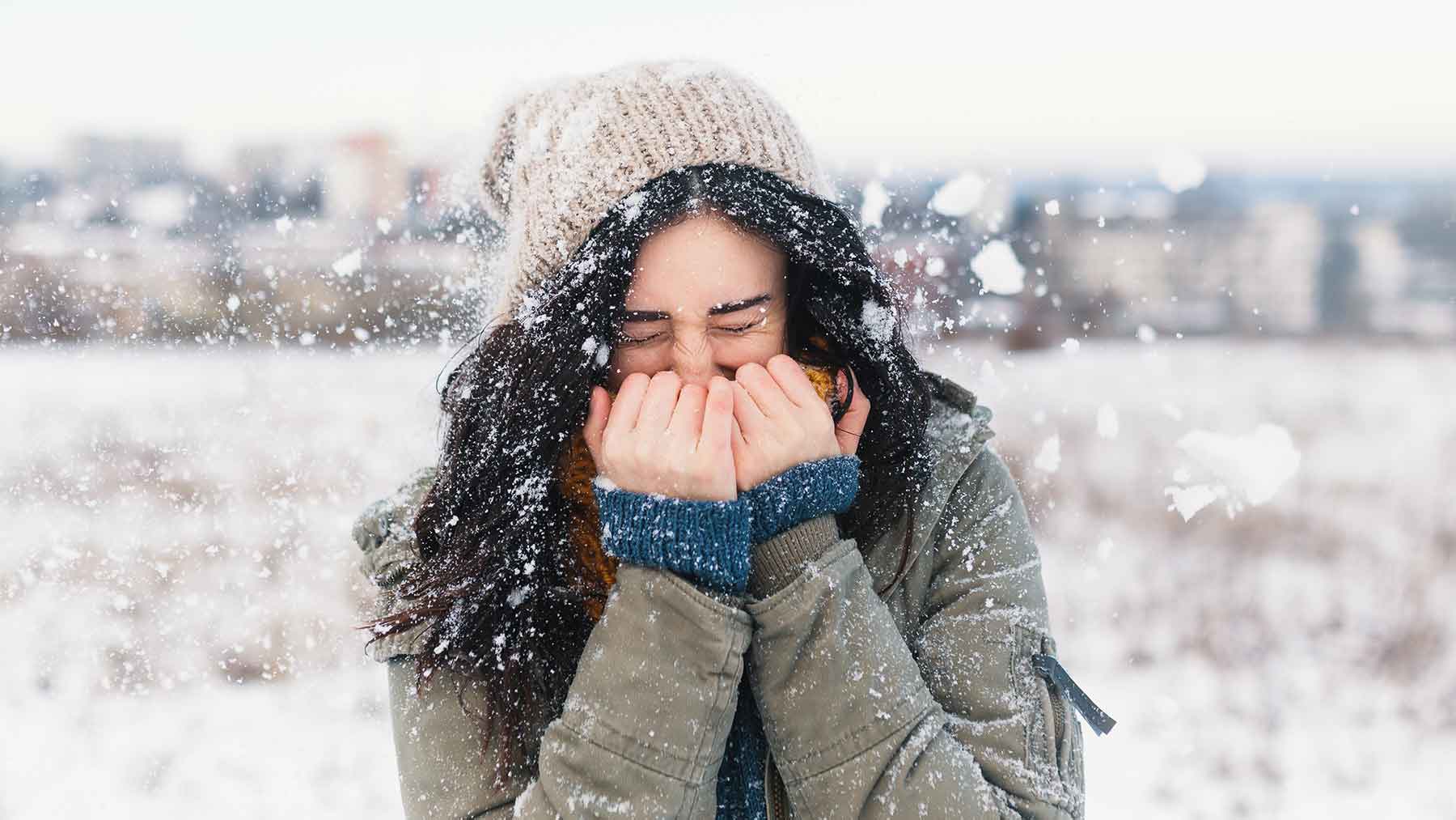 Woman Shivering In Cold Weather