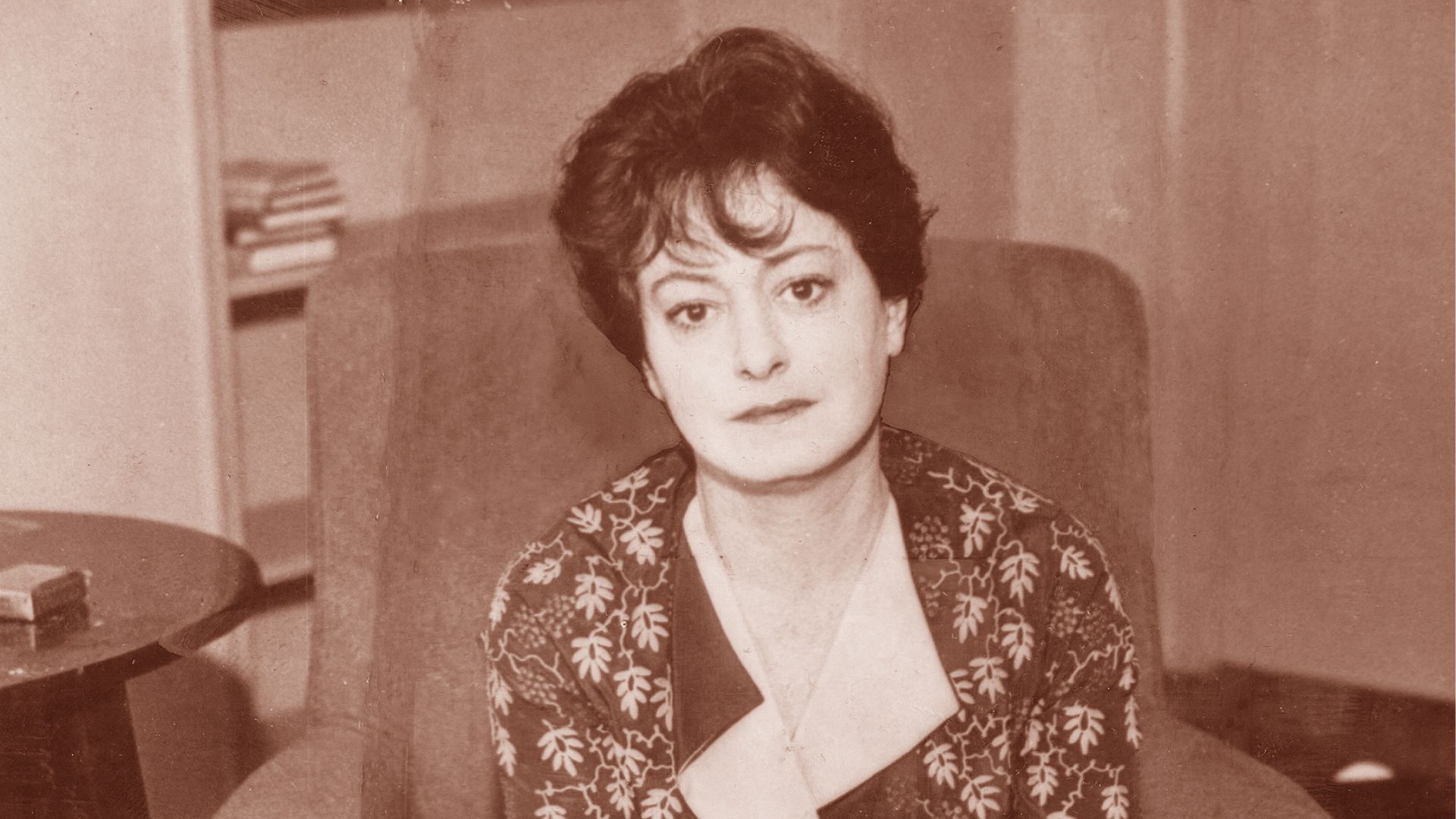 Dorothy Parker Sitting On A Chair