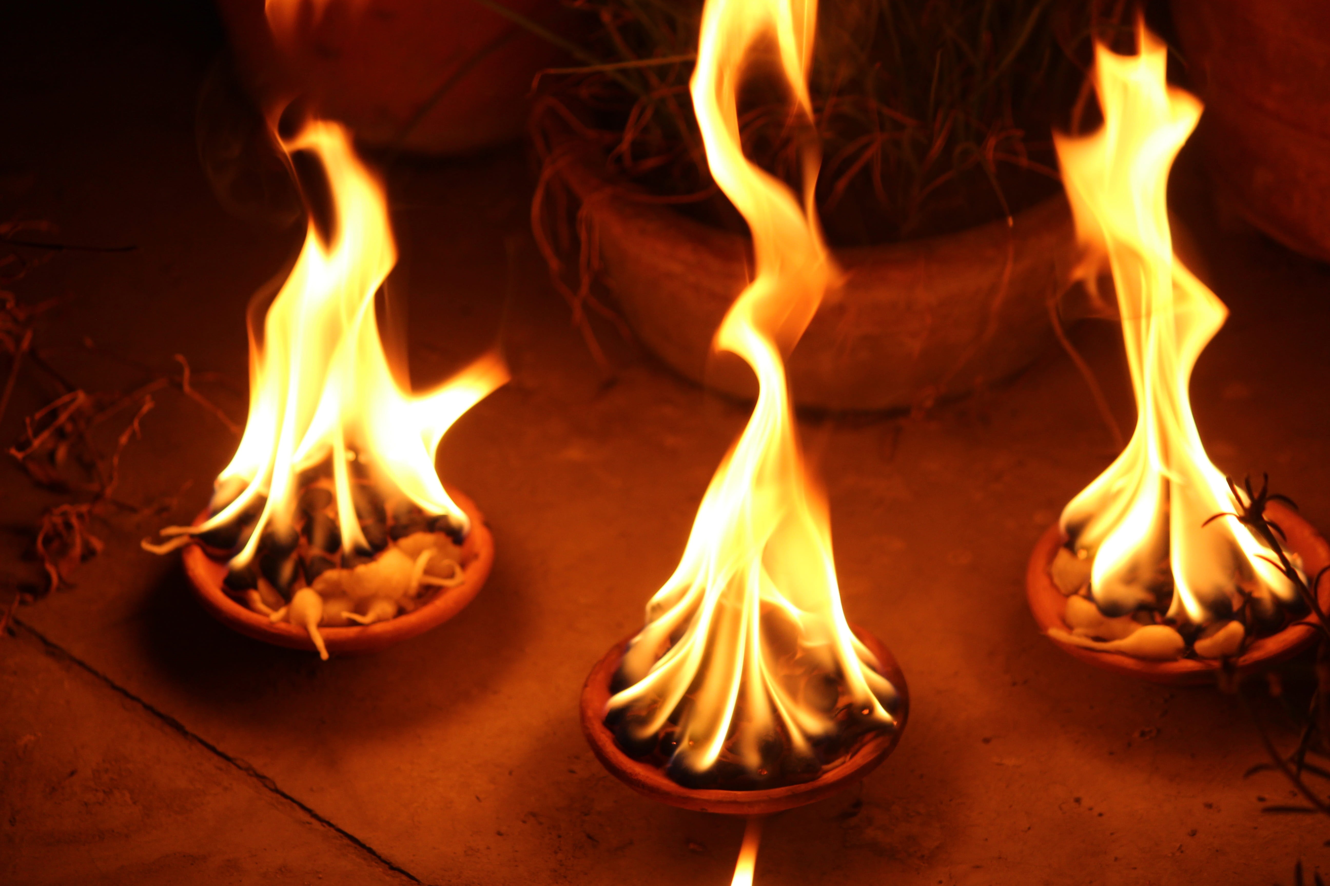 Three Fire Burning Diya