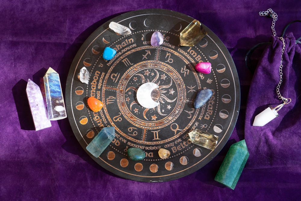 Gemstones on top of a Wooden Zodiac Wheel