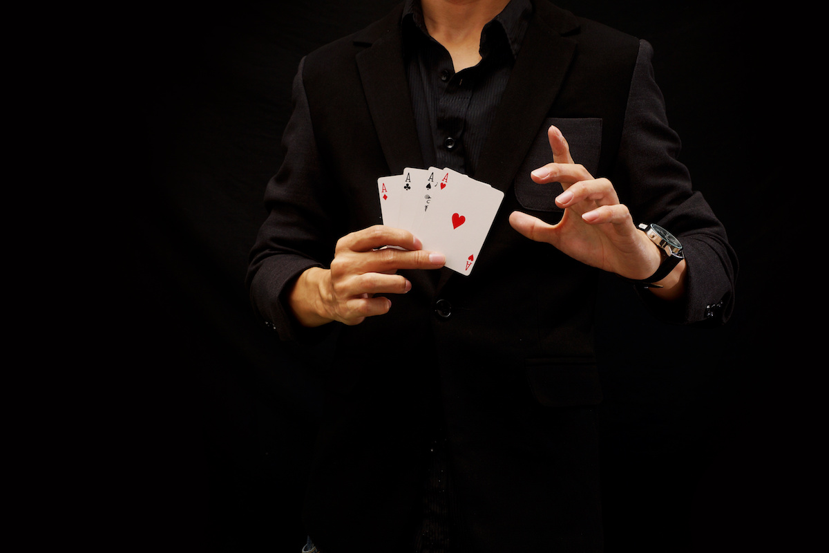 A man doing a card magic trick.