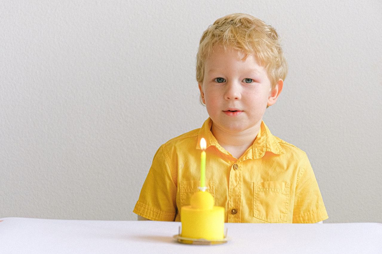 Boy In Yellow Button Up Shirt