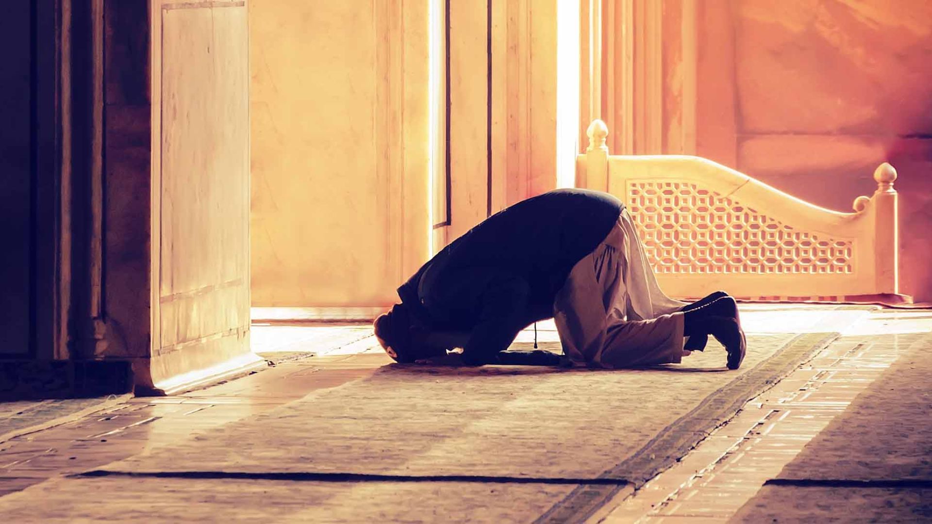 A Muslim Man Praying In Mosque
