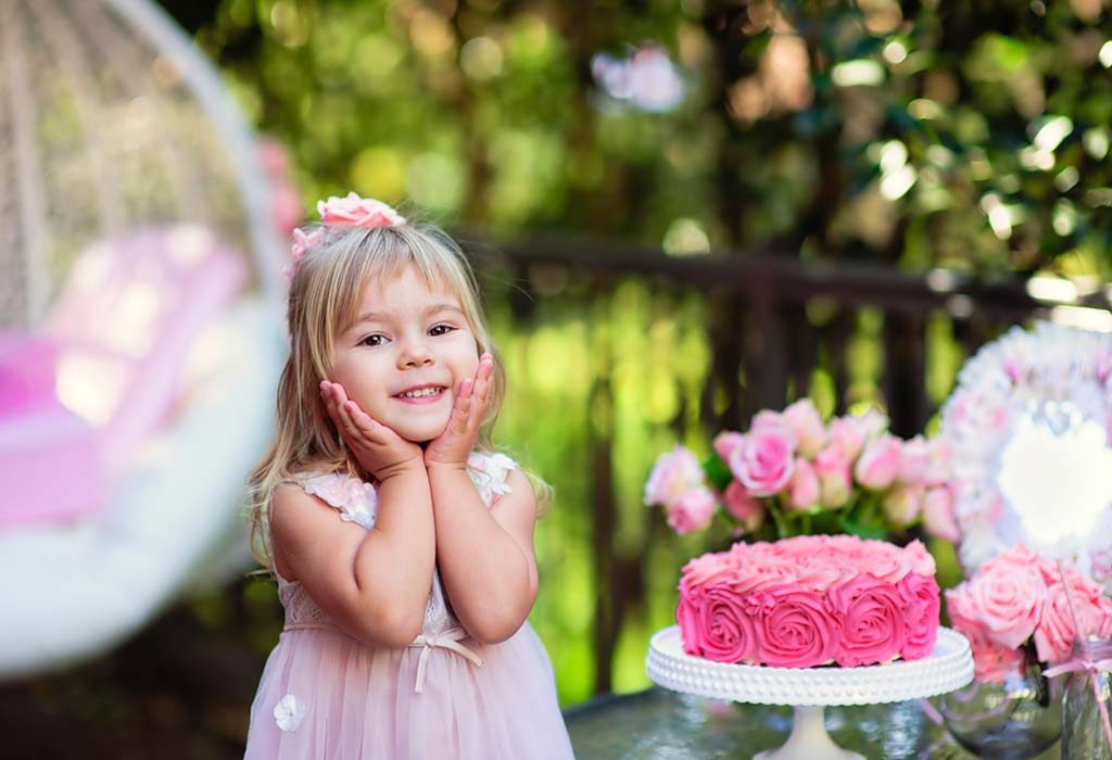 A Cute Girl In Pink Dress With A Pink Cake