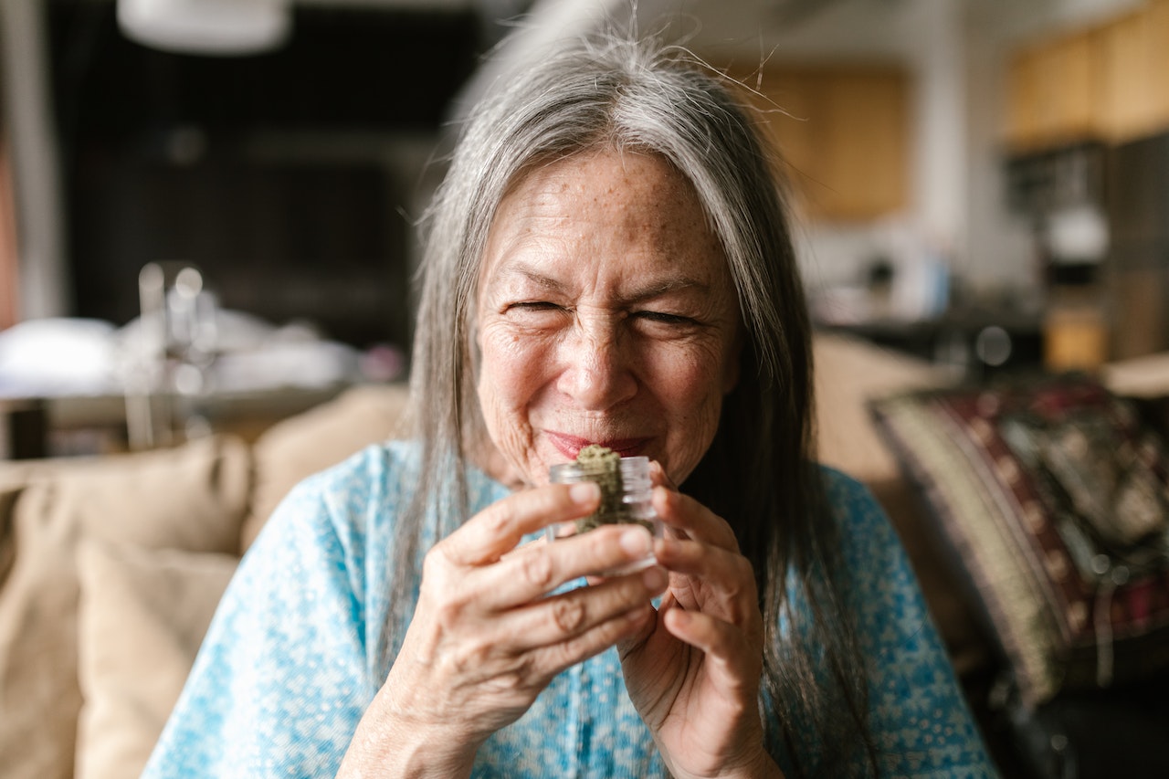 Elderly Woman Smelling Sulfur