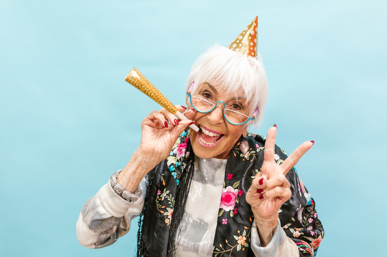 A Happy Elderly Woman Celebrating Her Birthday