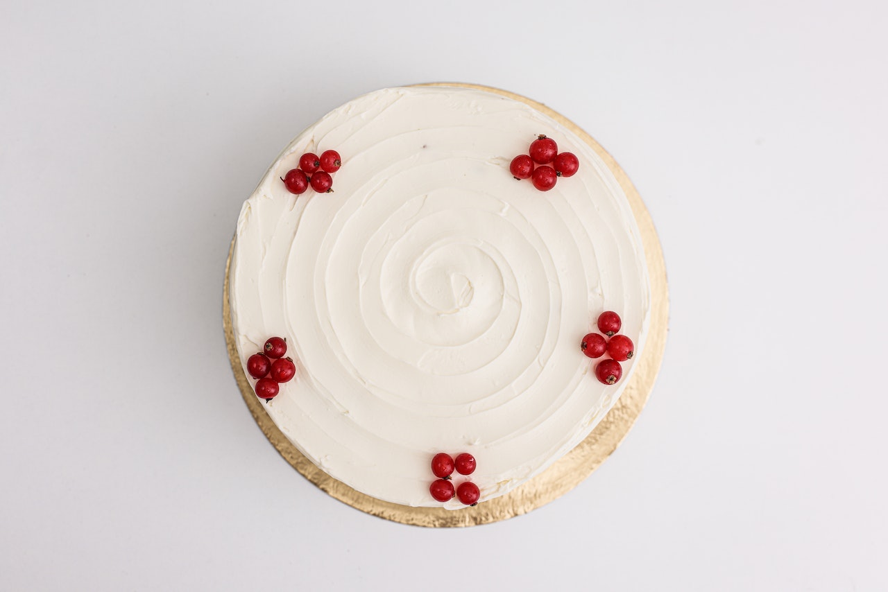 Delicious Birthday Cake on White Surface