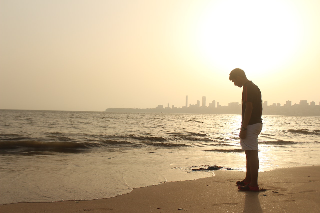 Man Standing on the Seashore