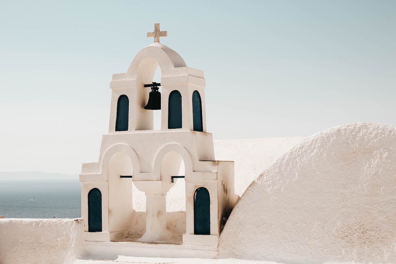 White Concrete Church With Cross on Top
