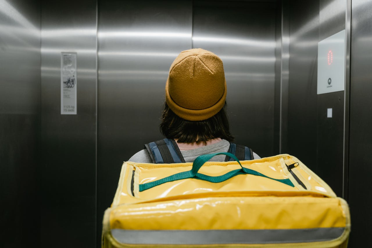 Woman Inside an Elevator