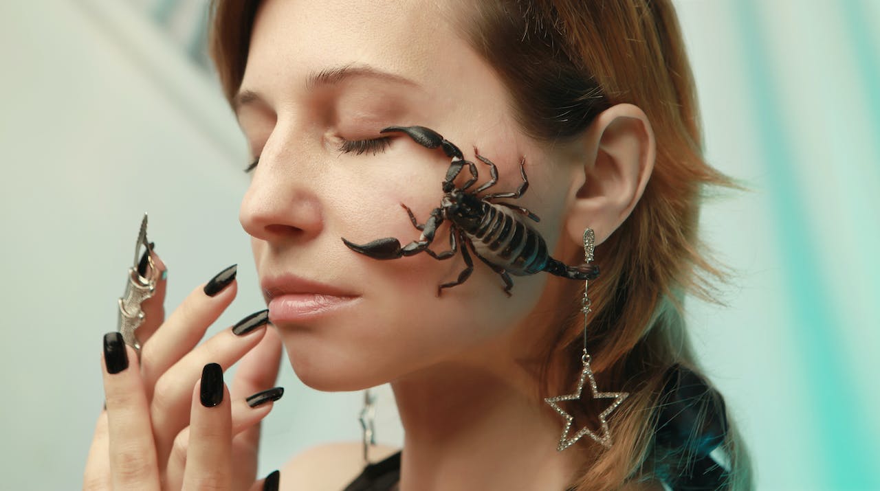 Scorpion on Woman's Face